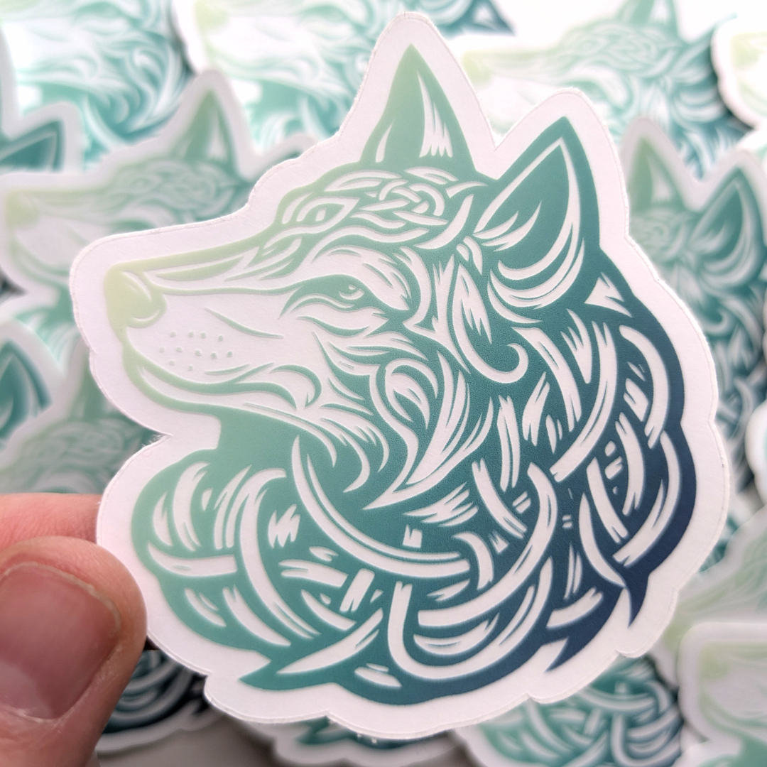 Transparent Nordic tribal wolf decal featuring flowing Celtic patterns in gradient teal coloration