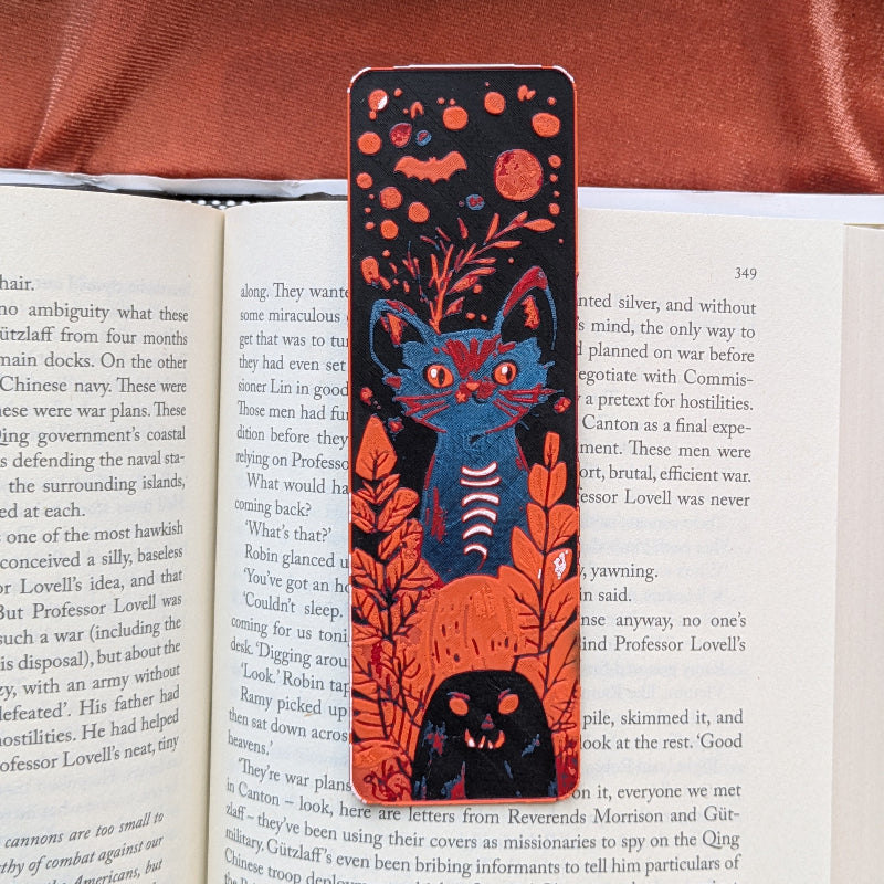 Autumn familiar cat bookmark with foliage and stars