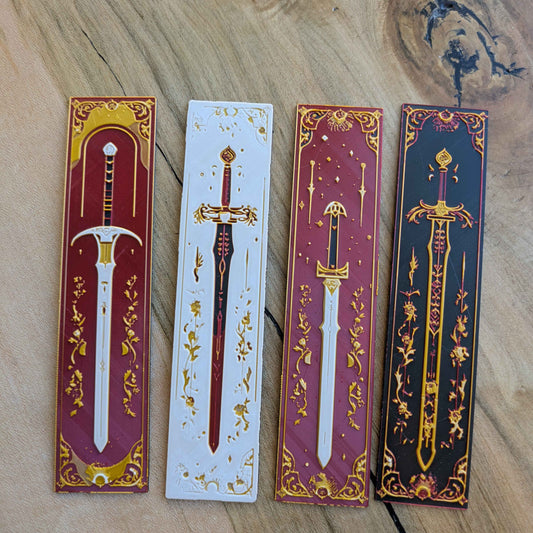 Set of 4 Celestial Gothic Sword Bookmarks featuring intricate sword designs in black, red, and white with gothic floral accents.