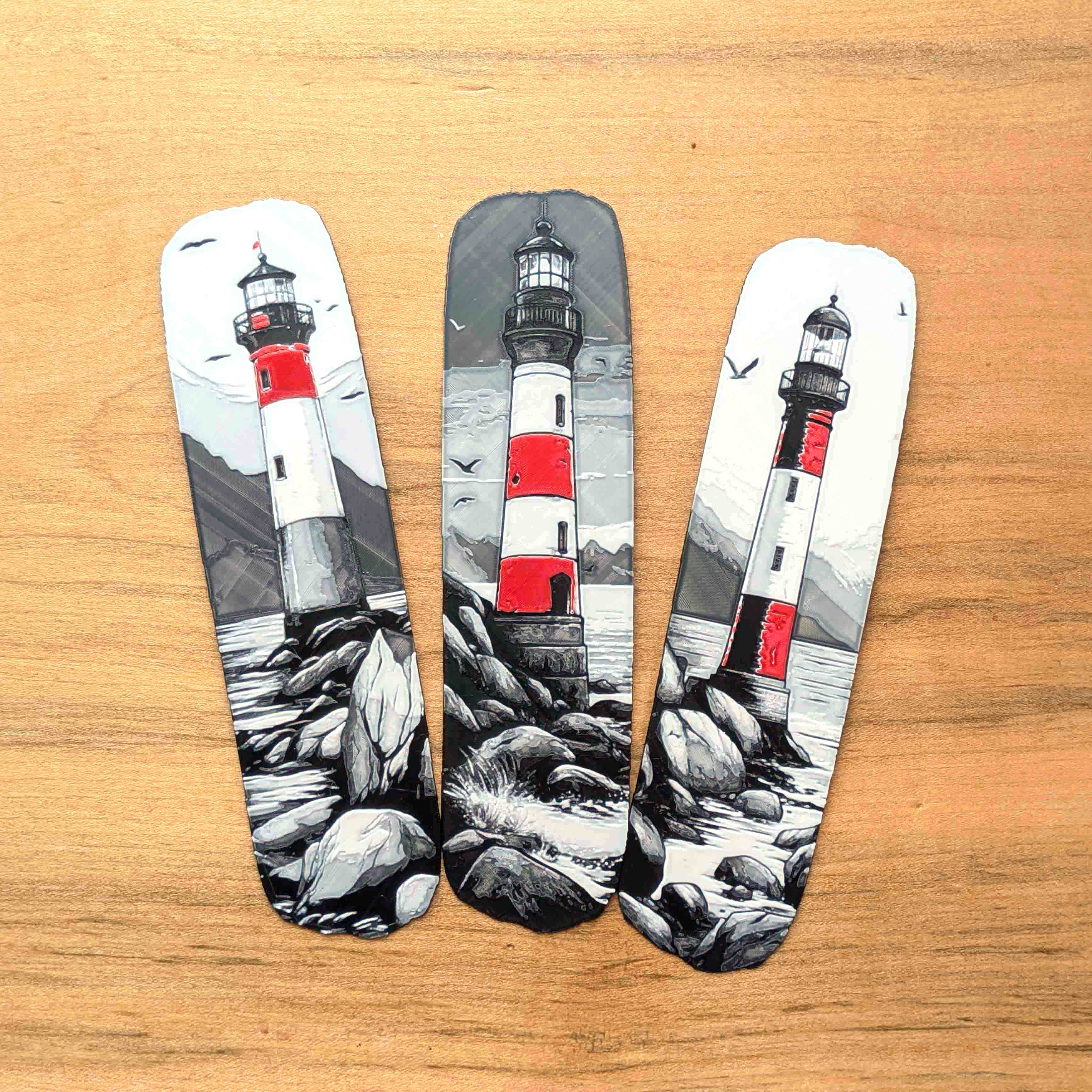 Set of three lighthouse art bookmarks inspired by coastal scenes