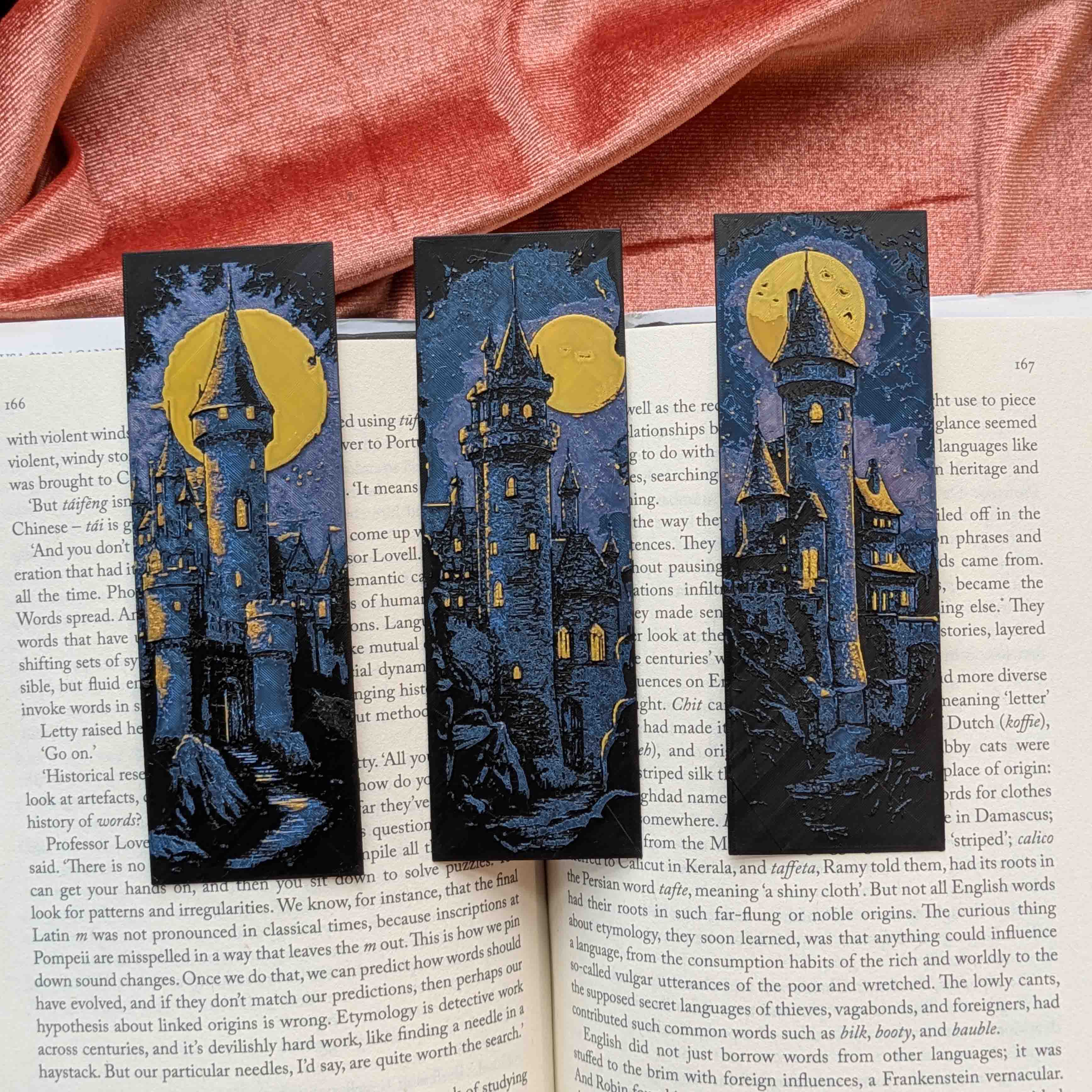 Set of three Moonlit Castle fantasy art bookmarks displayed together