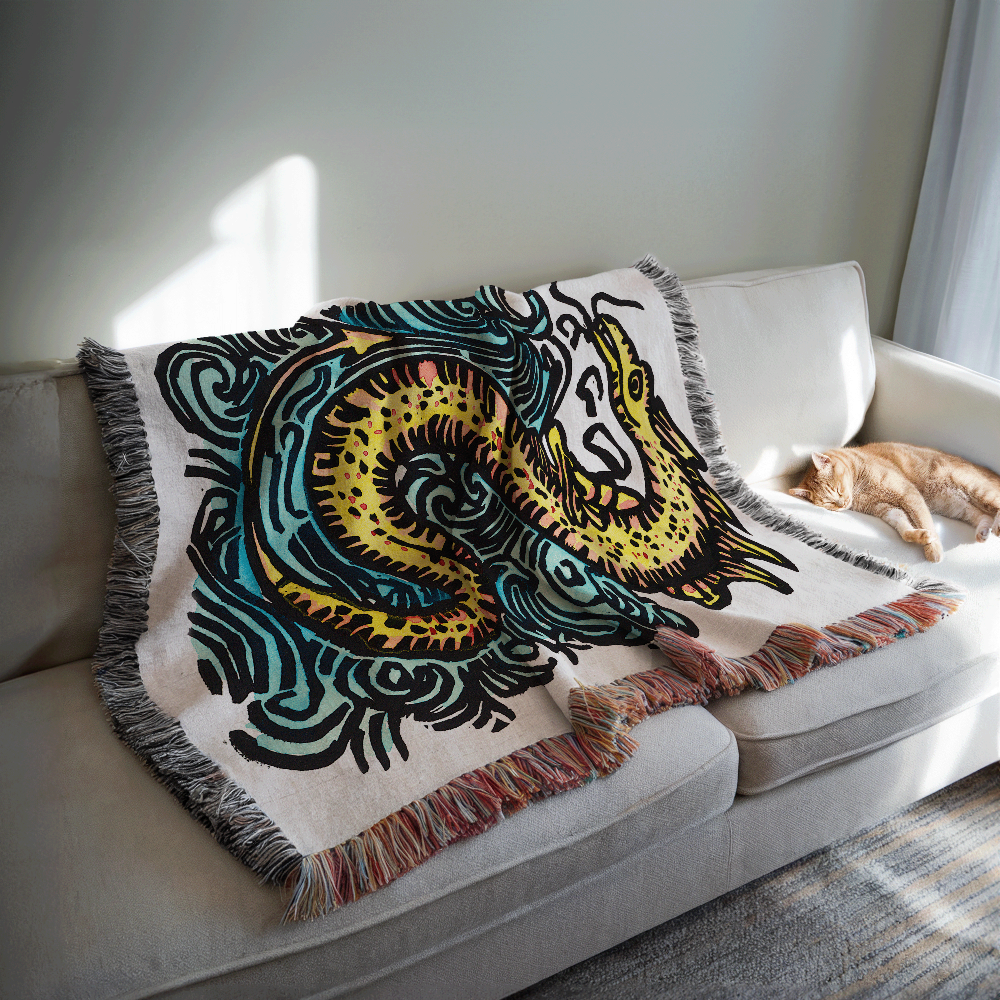 Full view of sea serpent and curling waves woven cotton blanket