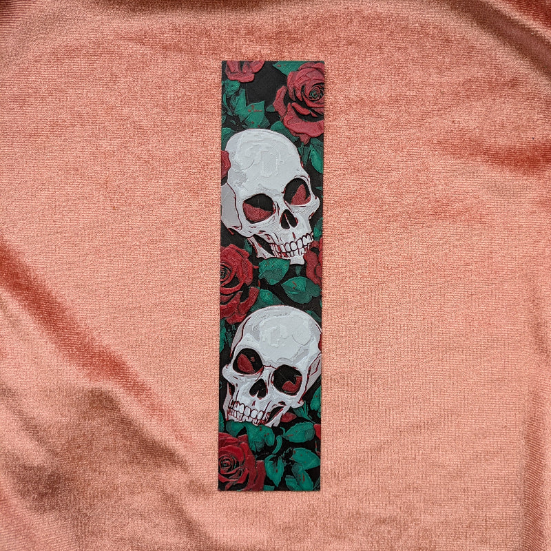 Center skull and rose gothic bookmark with dark floral artwork and textured finish