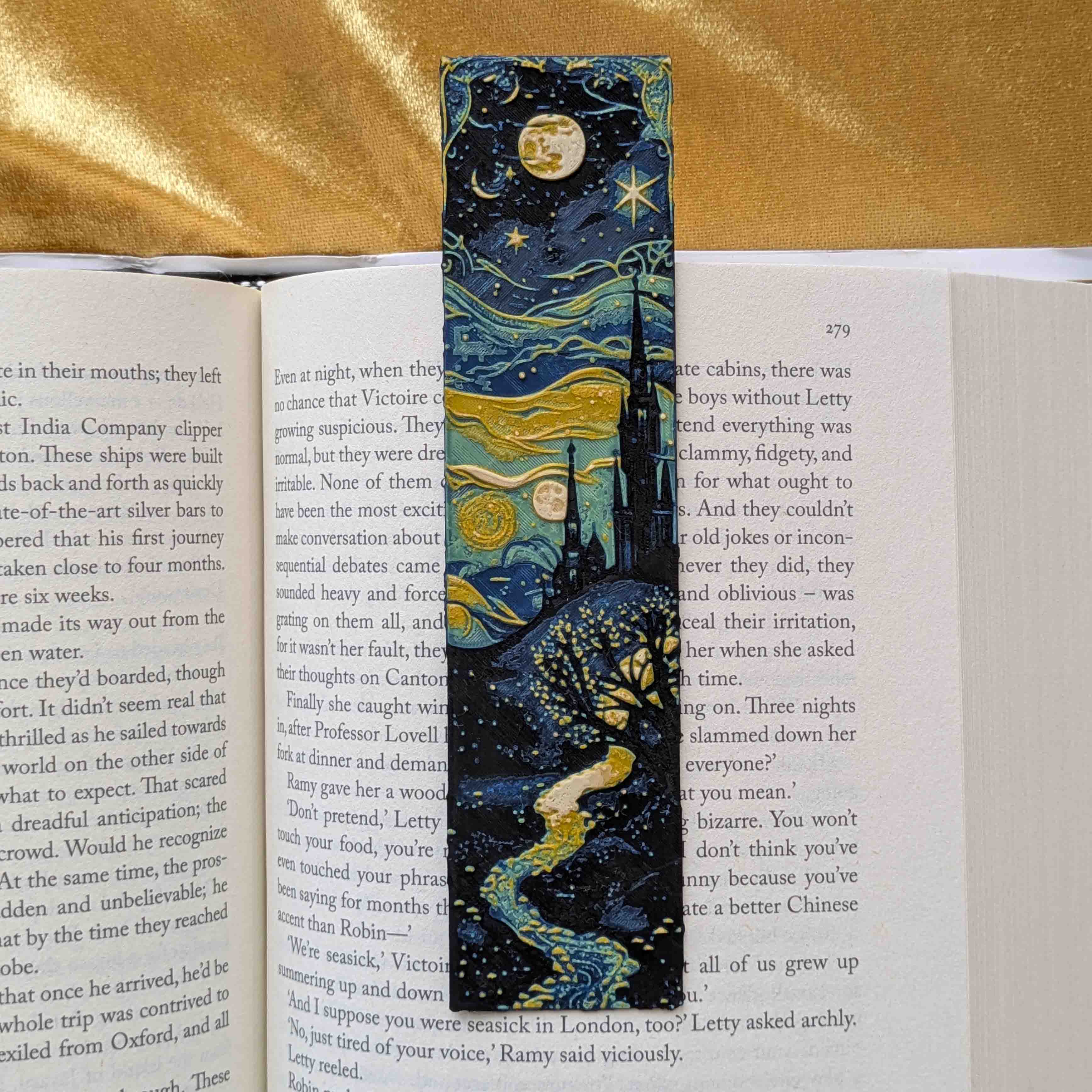 Starry Night inspired gothic bookmark with moonlit landscape and flowing stars