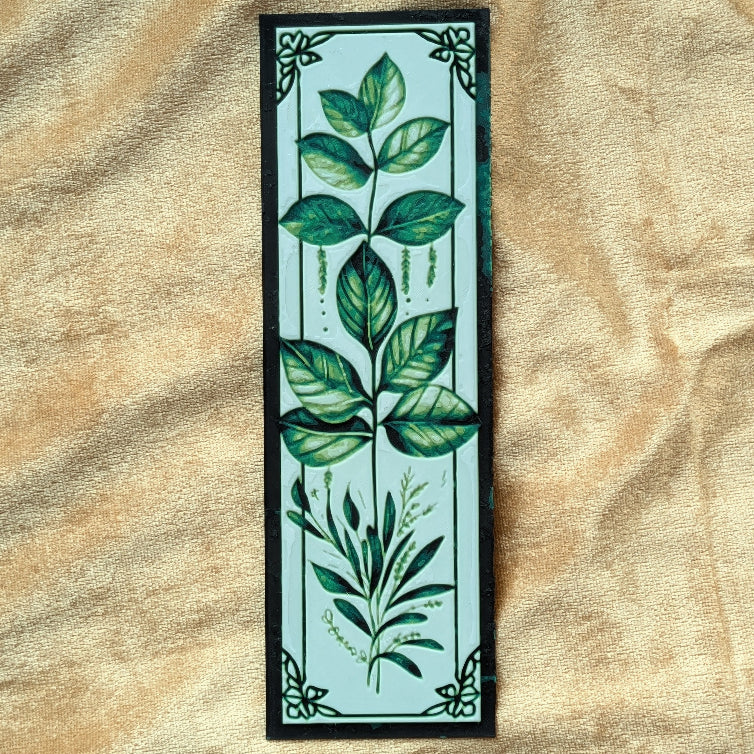 Verdant Vine botanical bookmark featuring flowing green leaf artwork inspired by illuminated manuscripts.