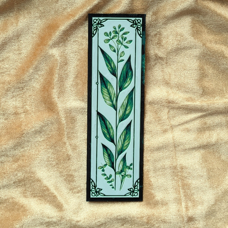 Close-up detail of Wild Herb bookmark showing botanical illustration and decorative border elements.