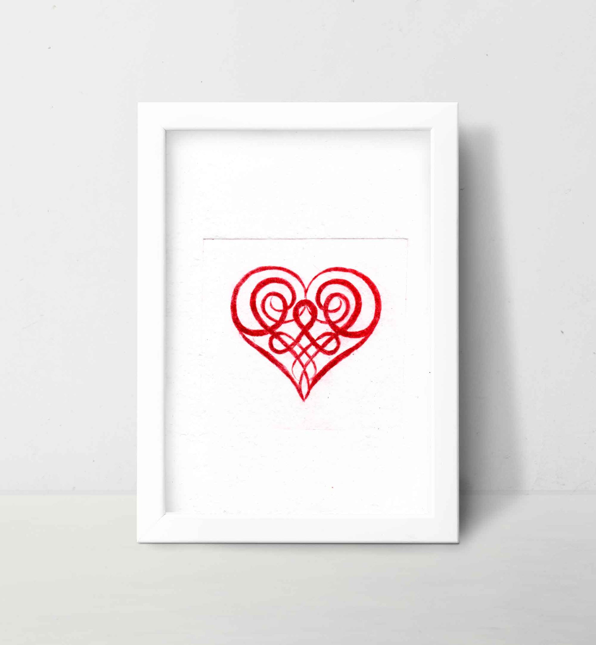 Red Celtic Knot Heart on white background